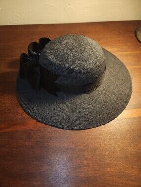 Importina Elegant Black Wide-Brim Straw Hat with Ribbon Bow